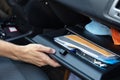 Driver Opening Glovebox Compartment Royalty Free Stock Photo