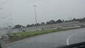 Driver point of view on rainy onramp to 401 expressway in Toronto