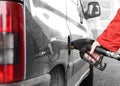 The driver pumping gasoline. Royalty Free Stock Photo