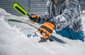 Driver Removing Snow and Ice From His Car Windshield Royalty Free Stock Photo