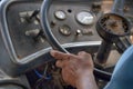 driver\'s hands on steering wheel of old bus