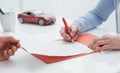 Driver signing a car insurance Royalty Free Stock Photo