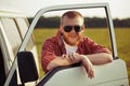 Driver of a truck in sunglasses Royalty Free Stock Photo