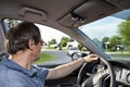 Driver turning at street corner