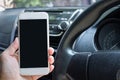 The driver uses the phone while driving. screen for mockup. Concept of using a car phone