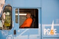 Driver waits in the money transporter for his colleague who picks up the money boxes Royalty Free Stock Photo