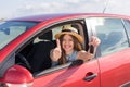 Driver woman smiling showing new car keys and car. Royalty Free Stock Photo