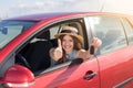 Driver woman smiling showing new car keys and car. Royalty Free Stock Photo