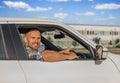 The driver is a young attractive man driving a car. Royalty Free Stock Photo