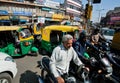 Drivers, cars and rickshaws on the busy street Royalty Free Stock Photo