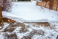 Driveway half shoveled of heavy snow with edge showing how deep it is Royalty Free Stock Photo