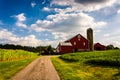 Driveway and red barn in rural York County, Pennsylvania. Royalty Free Stock Photo