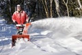 Man using Snow Blower Royalty Free Stock Photo