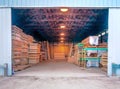 Driveway thru lumber warehouse building for loading and unloading Royalty Free Stock Photo