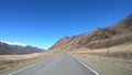 Driving along mountain asphalt road Chuysky Tract along Kurai Ridge and river Chuya on Altai betveen Kosh-Agach and Kurai