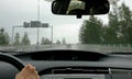 Driving in bad weather - heavy rain on the road trip