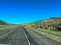 Driving through the badlands hills and mountains in Theodore Roosevelt National Park in North Dakota Royalty Free Stock Photo