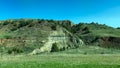 Driving through the badlands hills and mountains in Theodore Roosevelt National Park in North Dakota Royalty Free Stock Photo