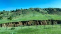 Driving through the badlands hills and mountains in Theodore Roosevelt National Park in North Dakota Royalty Free Stock Photo