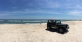 Driving on the beach panoramic Assateague Island