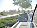 Driving On California Roads Near The Coast With Rear View Mirror From Car In Frame.