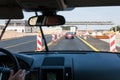 driving car along repairing area on Autostrada A2