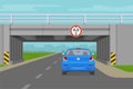 Driving a car. Car going through the tunnel under the bridge. Low bridge sign. Royalty Free Stock Photo