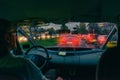 Driving a car in the city at night in traffic jams Royalty Free Stock Photo