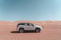 Driving the car in the desert Royalty Free Stock Photo