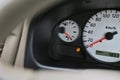 Driving car with digital oil gasoline level sign on the panel dashboard