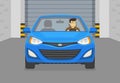 Driving a car. Front view of a blue car entering the garage. Indoor parking inside view. Royalty Free Stock Photo