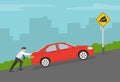 Businessman or manager pushing a broken red sedan car up the hill by city road. Steep ascent or descent road warning sign.