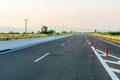 Driving car on a highway with view on scenic hills and mountains Royalty Free Stock Photo