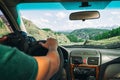 Driving car on the mountain road Royalty Free Stock Photo