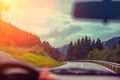 Driving a car on mountain road Royalty Free Stock Photo