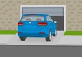 Driving a car. Perspective back view of a blue suv car entering the garage. Car on driveway.