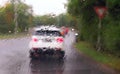 Driving a car in the rain storm Royalty Free Stock Photo