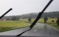 Driving a car on a rainy day with blurred vision Royalty Free Stock Photo