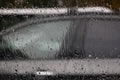 Car on road in the rain with raindrop over the wind shield Royalty Free Stock Photo