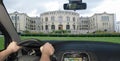 Driving a car towards the Norwegian Parliament, Oslo, Norway