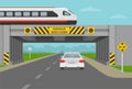 Driving a car. Train overpass with low bridge sign. Overheight with amber flashers.