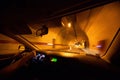 Driving car through tunnel Royalty Free Stock Photo