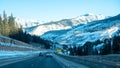 driving through colorado rockies and ski resort mountains