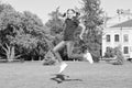 Driving dancer excellence. Little dancer perform leap on green grass. Cute girl dancer dancing energetic dance. Adorable Royalty Free Stock Photo