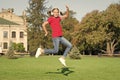 Driving dancer excellence. Little dancer perform leap on green grass. Cute girl dancer dancing energetic dance. Adorable Royalty Free Stock Photo