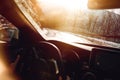 Driving details, sunny roads. Caucasian man driving a car Royalty Free Stock Photo