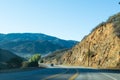 Driving down foggy highway in Malibu Creek State Park Royalty Free Stock Photo