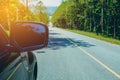 Driving Down the Road. Driving car on asphalt road in summer Royalty Free Stock Photo