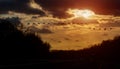 Sunrise road view with cars in front driving in early morning to work Royalty Free Stock Photo