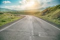 Driving on an empty open road in sunset Royalty Free Stock Photo